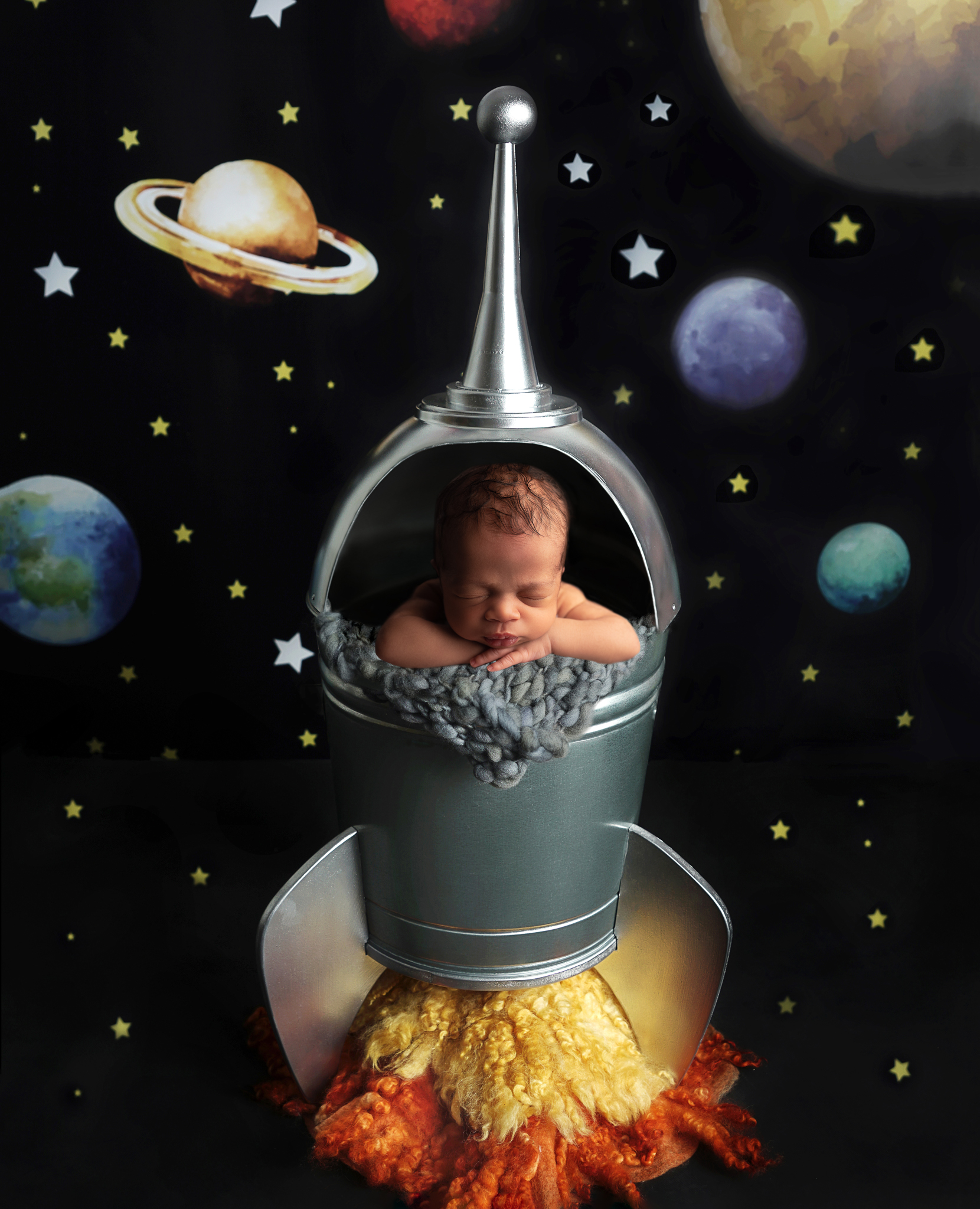 baby sleeping in a spaceship