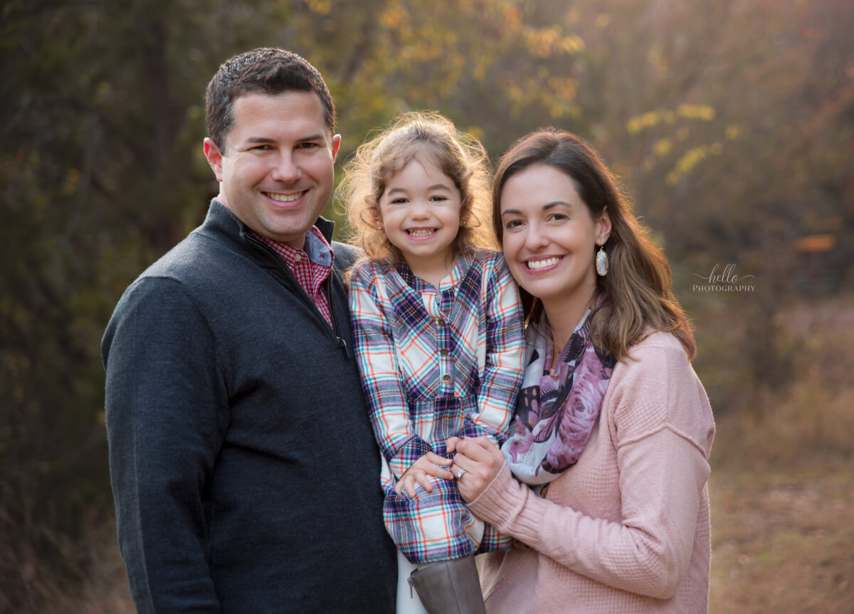 Family of 3 photo at sunset