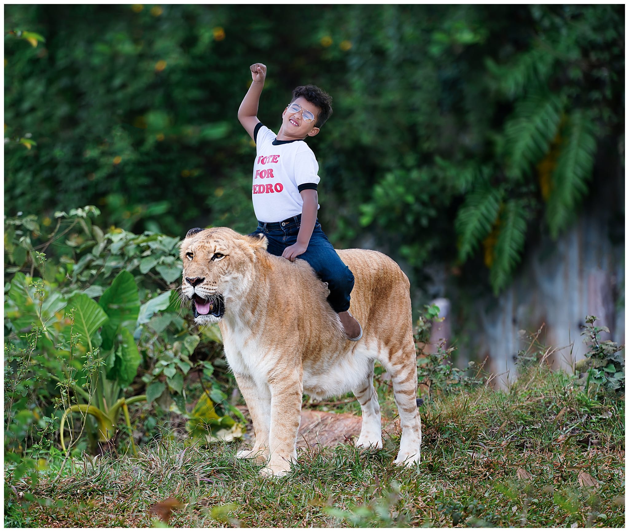 Photo of a kid riding a liger by Hello Photography in Austin, TX