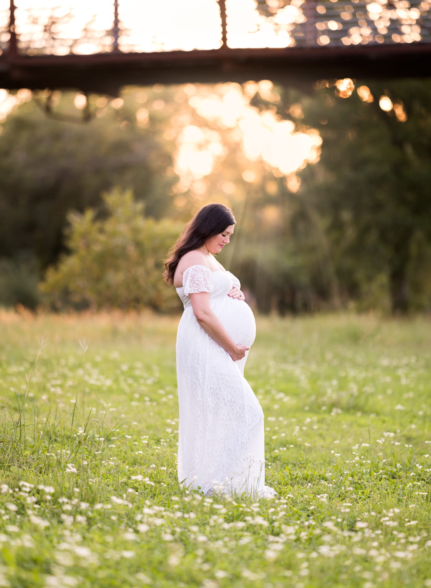Maternity photo at sunset by Hello Photography,