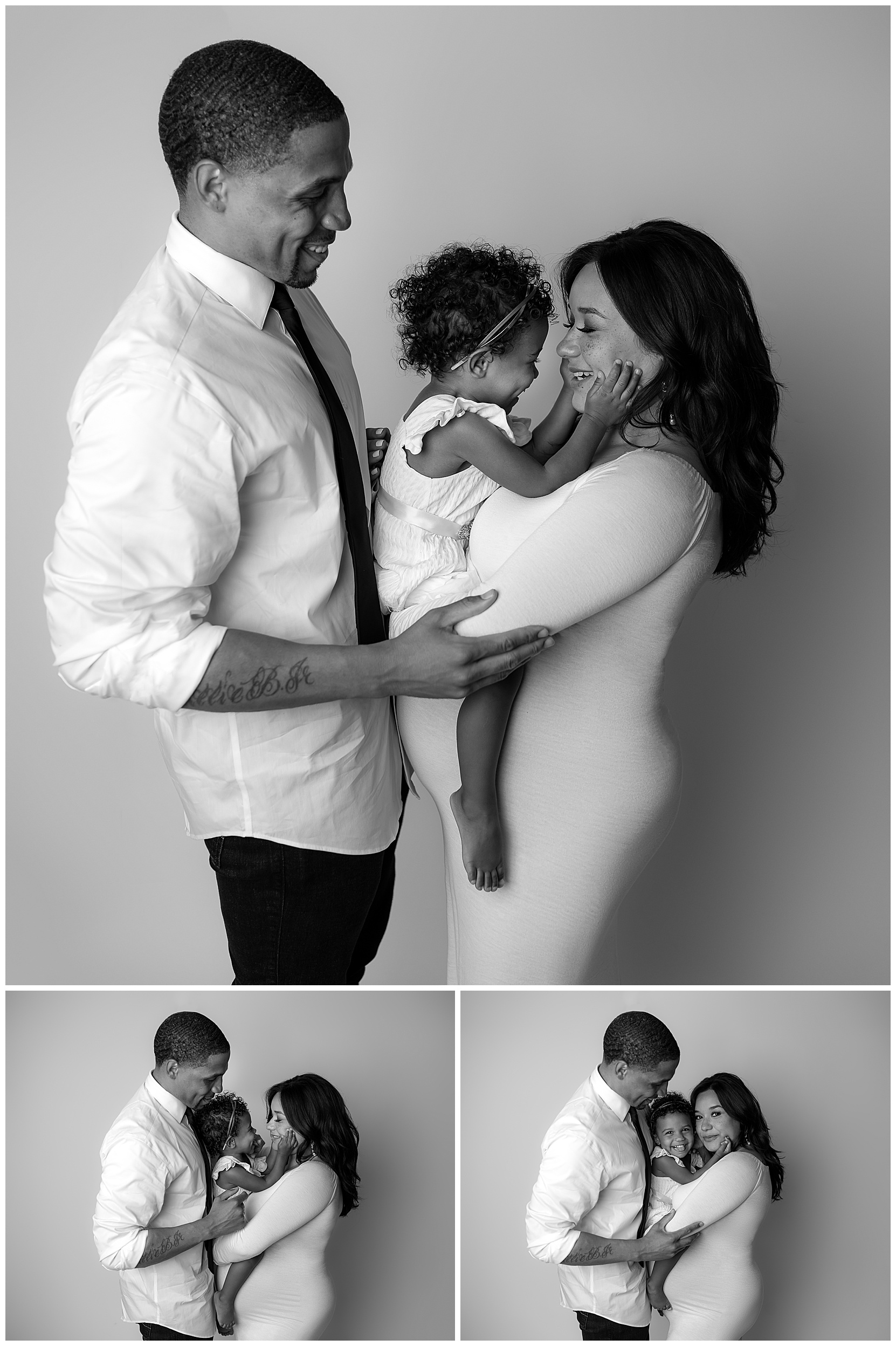 black and white maternity photo with parents and their child