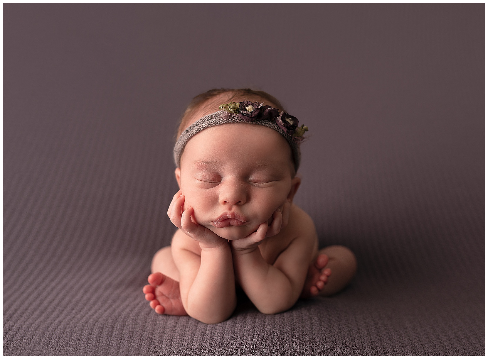 newborn baby in the froggy pose