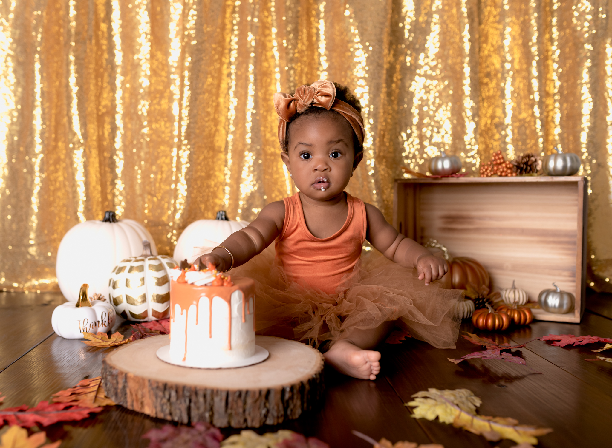 baby girl cake pumpkins gold orange