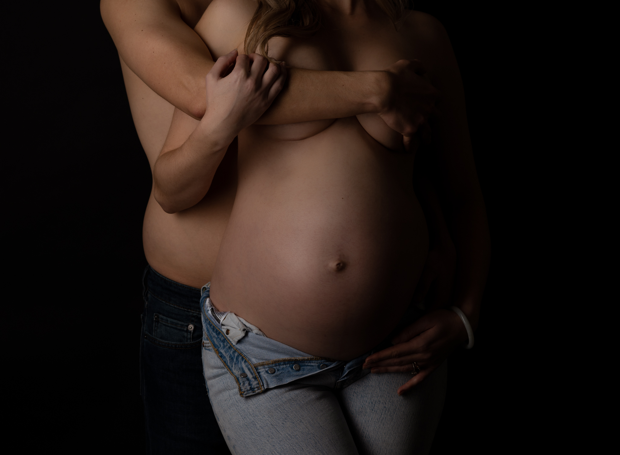 pregnant belly with arms