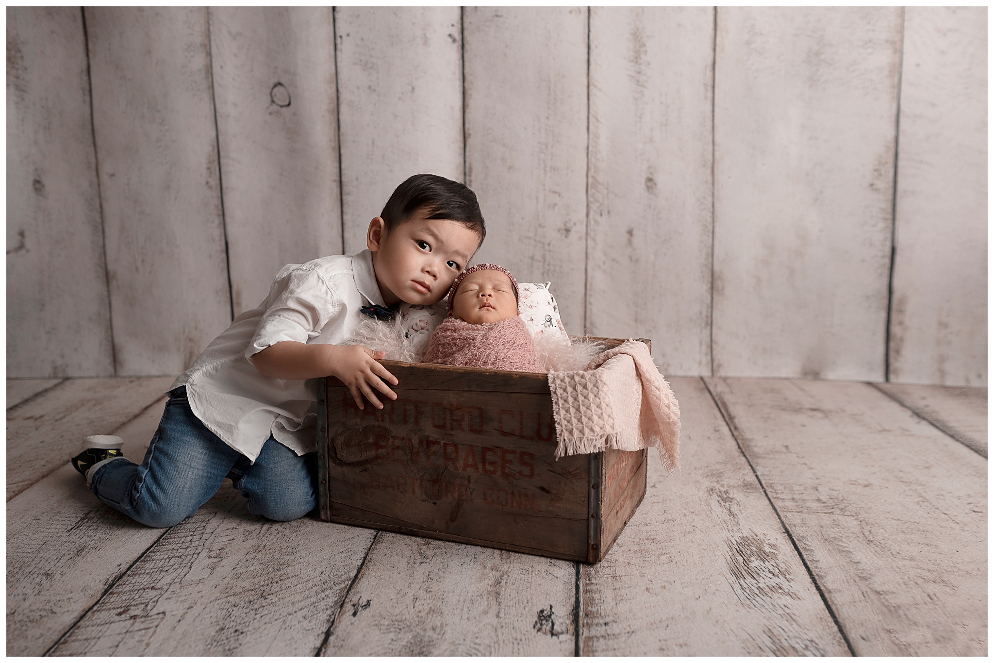 big brother baby sister box wood background