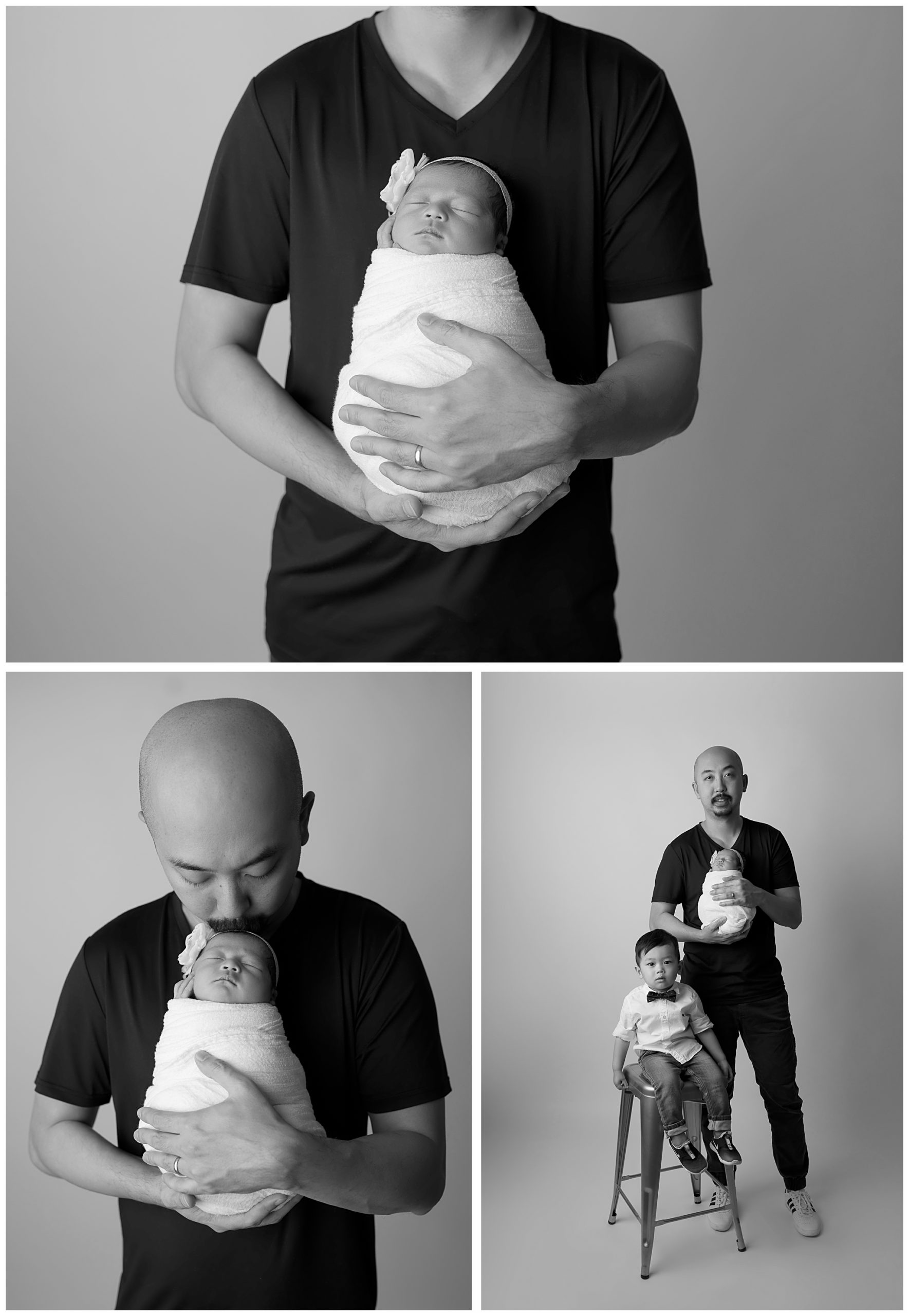 dad holding baby white wrap