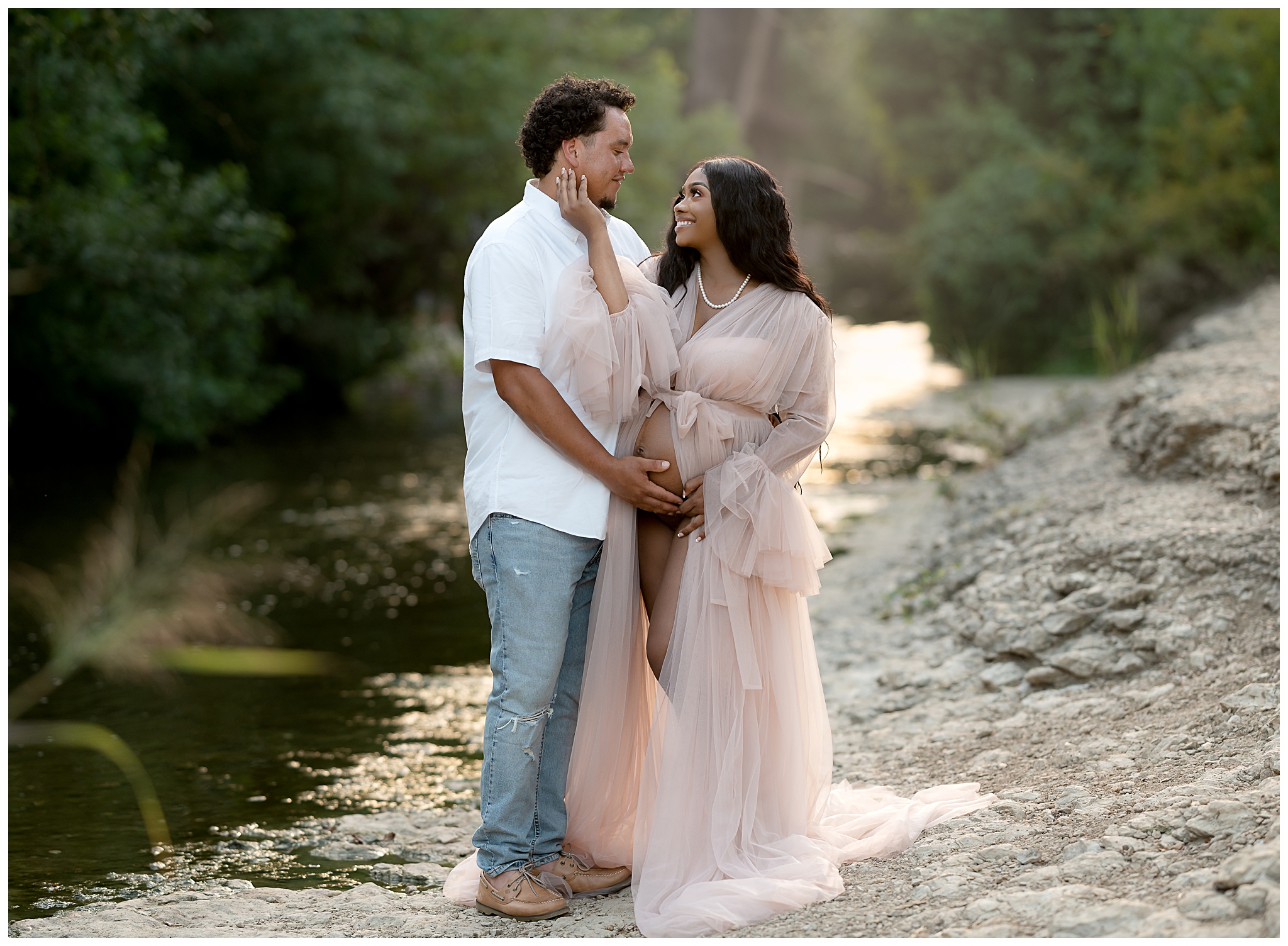 maternity pictures pink fluffy dress outdoors creek