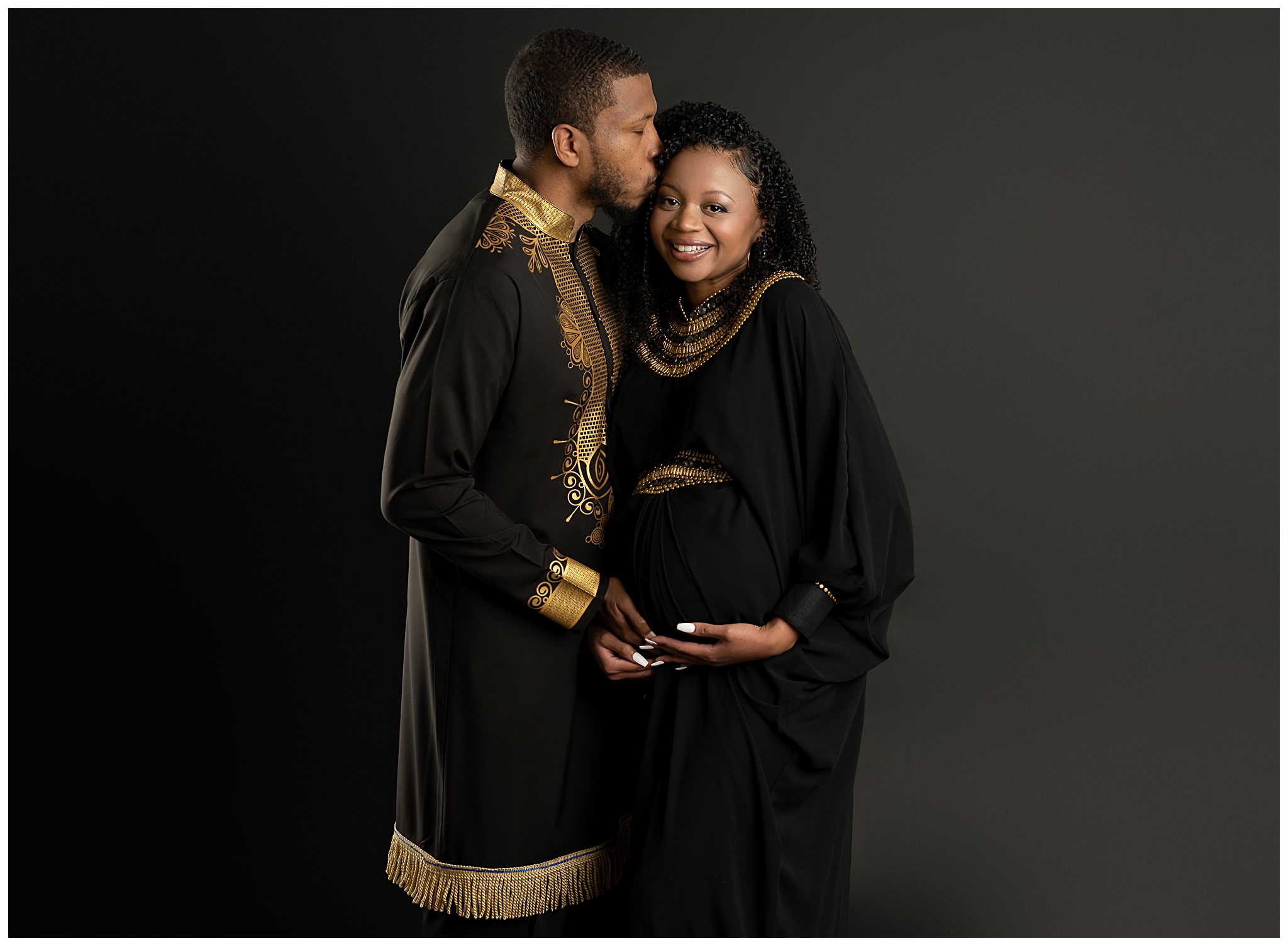 pregnant couple cultural outfits