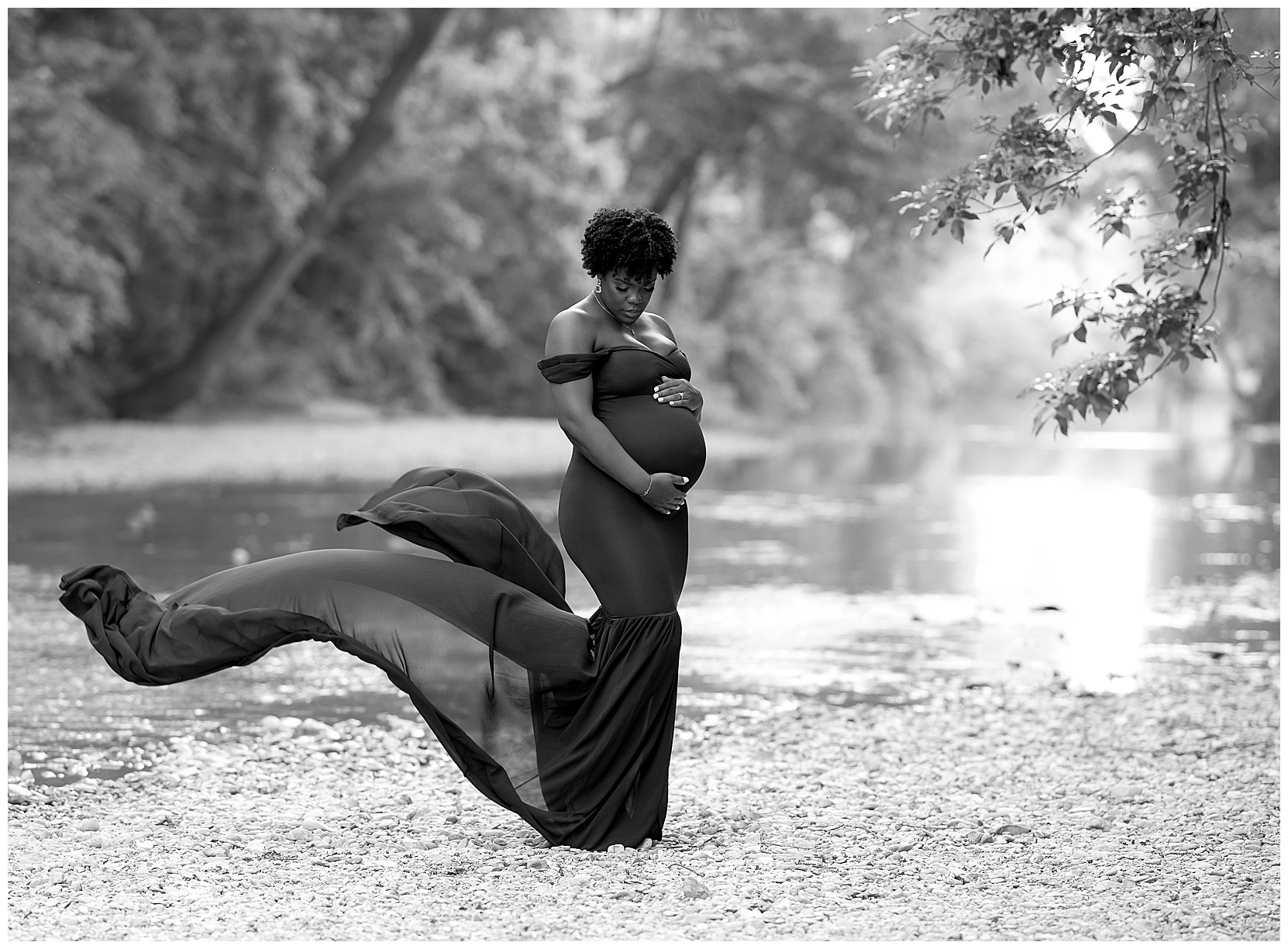 pregnant woman flowing dress creek
