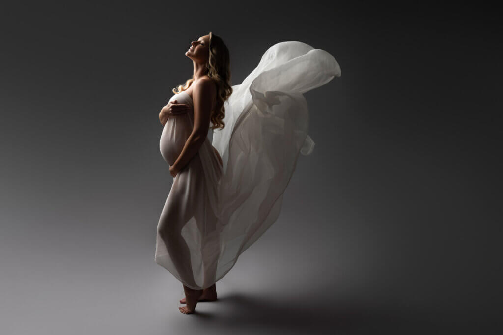Intimate maternity portraits during boudoir session Austin photographer