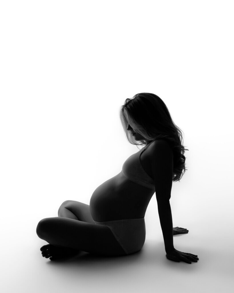 Intimate pregnancy boudoir portrait session Austin maternity photographer