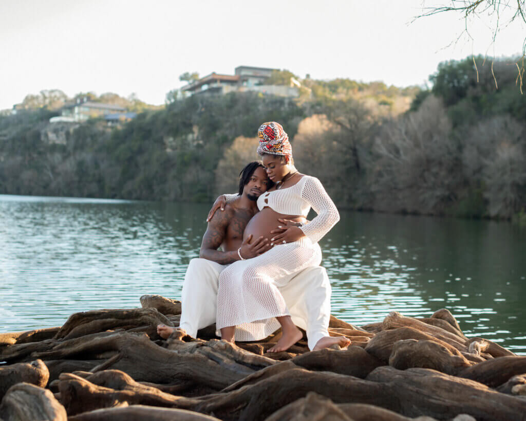 nfl football player marquise goodwin with his wife morgan during maternity photoshoot at Red Bud Isle Park in Austin