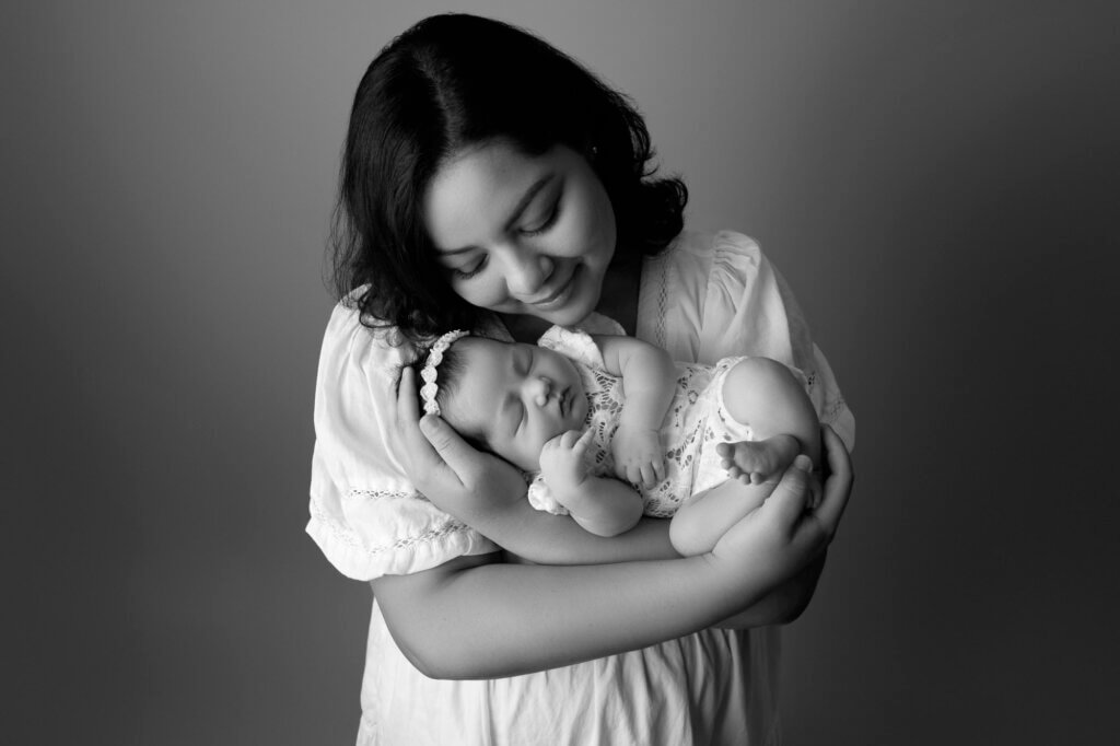 woman holding new baby