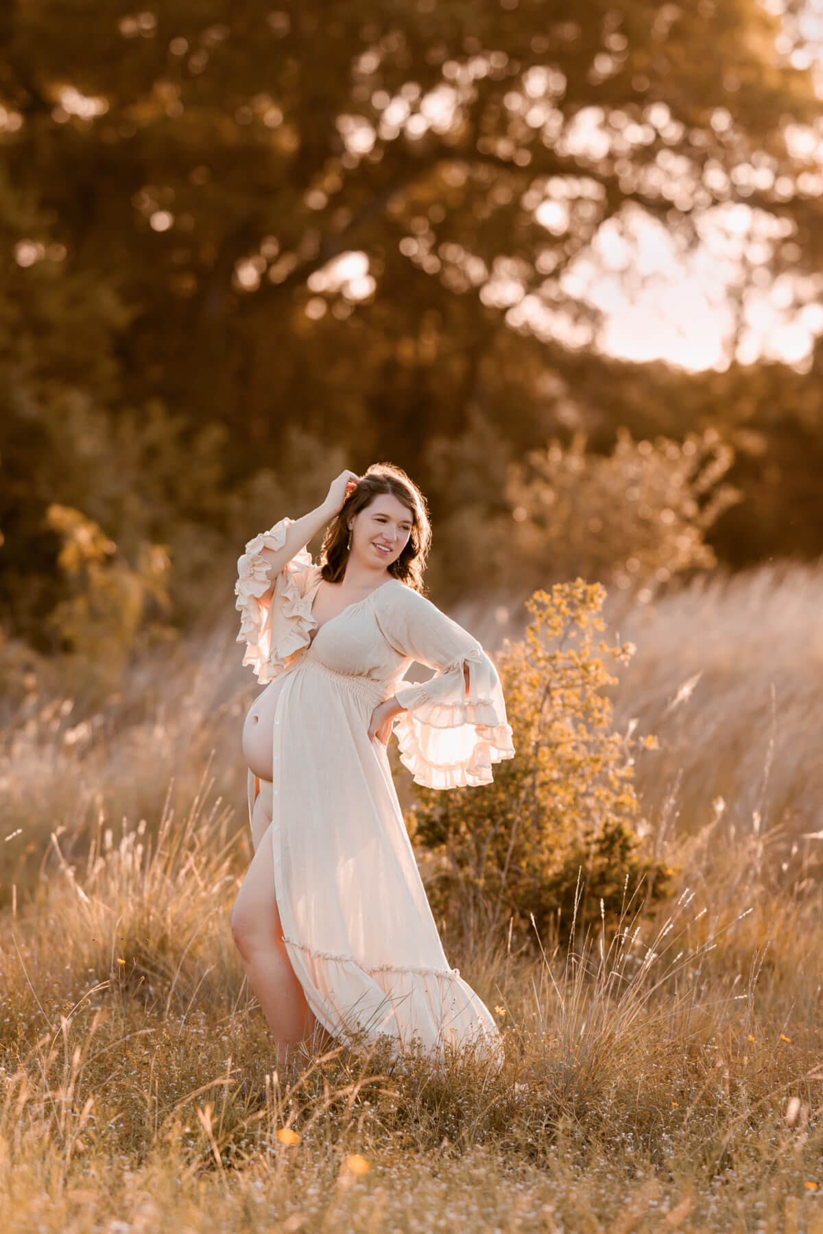 golden hour maternity photoshoot Balcones Canyonlands Bertram Texas white gown warm light