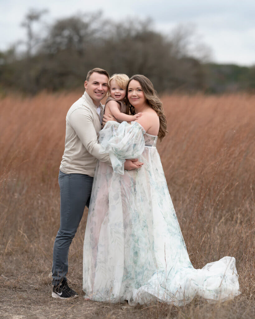 couple maternity photos Balcones Canyonlands Bertram Texas white flowy gown tall grasses