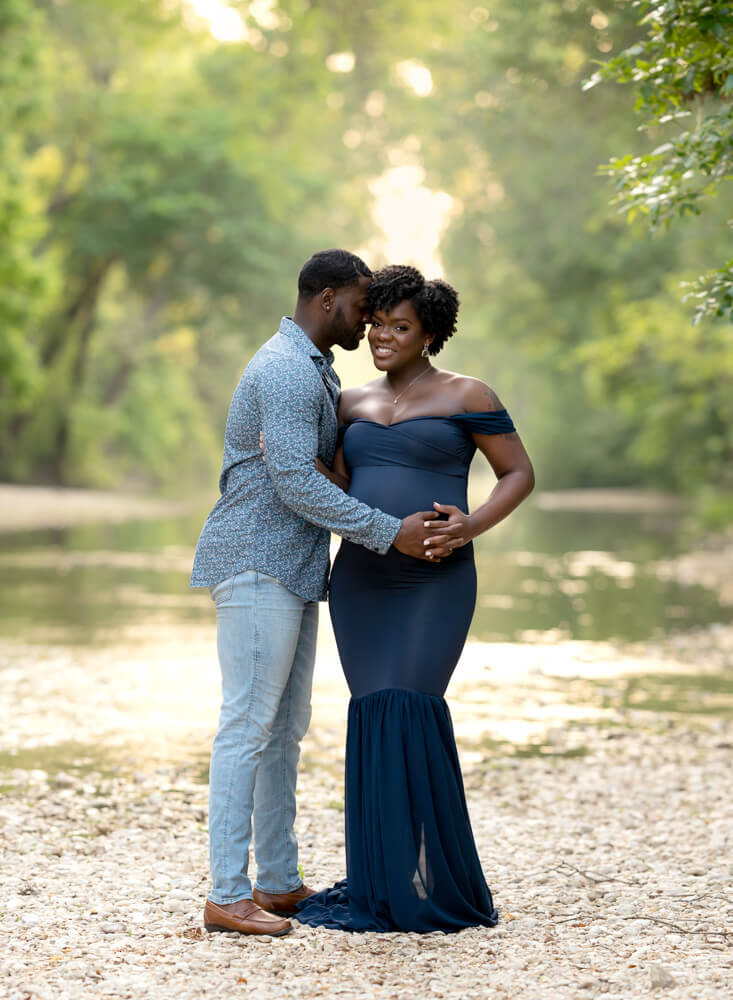 couple maternity session Richard Moya Park South Austin Texas navy fitted gown pecan trees