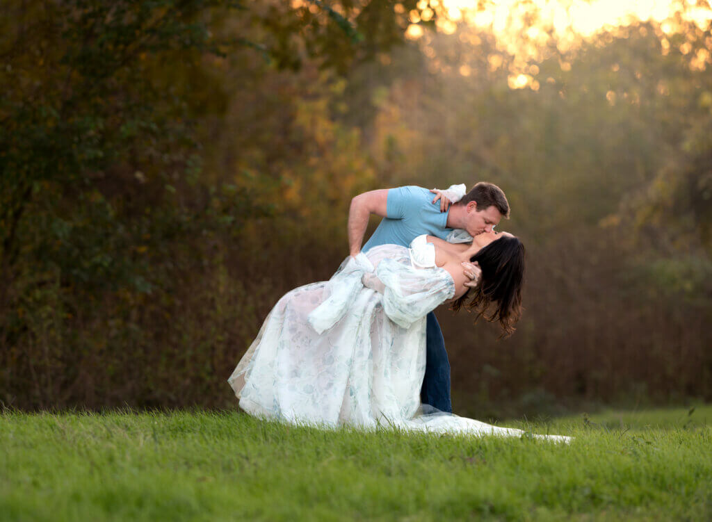 maternity session Richard Moya Park Austin TX couple green grass evening light white gown